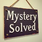 Mystery Solved Sign